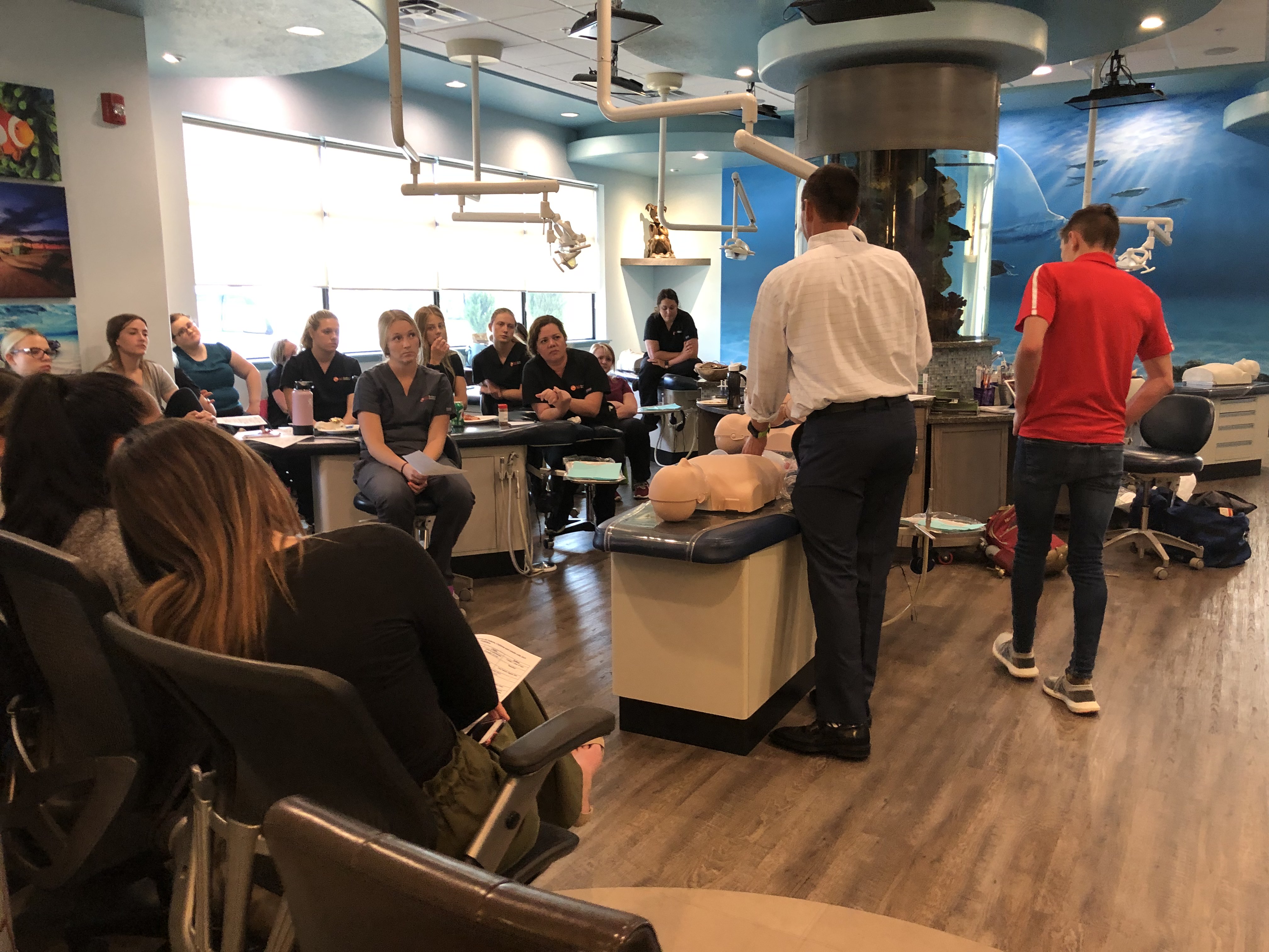 SVPD Team Listening to our CPR instructor demonstrate life saving techniques.